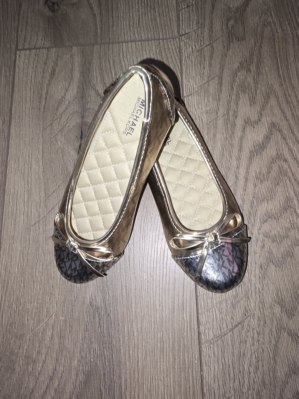 Michael Kors Metallic Gold Ballet Flats with Black Logo Toe